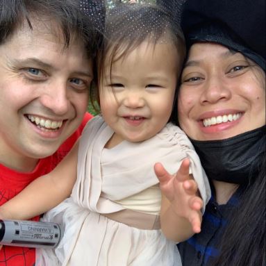 Glenda Bautista with her husband and daughter